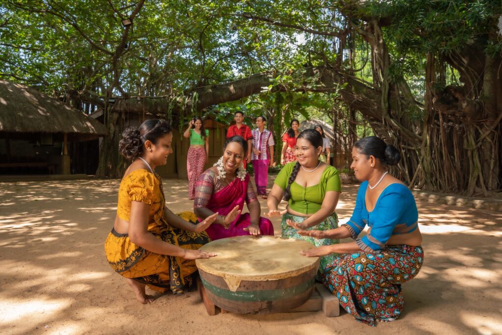 Image of playing Raban, a traditional drum celebrating Sinhala and Tamil New Year.