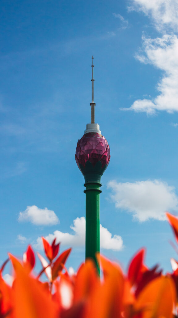 A majestic lotus flower blooms into the sky, representing the island nation's resilience and growth. The 350-meter-tall Lotus Tower offers breathtaking panoramic views of Colombo.