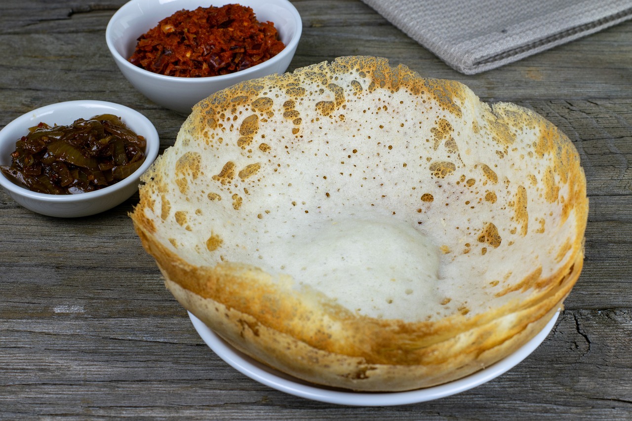 An image of Sri Lankan Hoppers with condiments